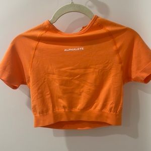 MOVING SALE. LOTS OF ALPHALETE CHECK OTHER LISTINGS! Never worn crop top. Size S